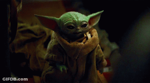 Baby Yoda Looking At Camera With Scarf GIF