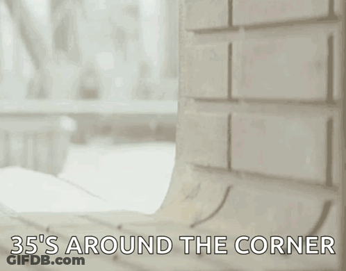 Baby Yoda Peeking Behind Wall GIF