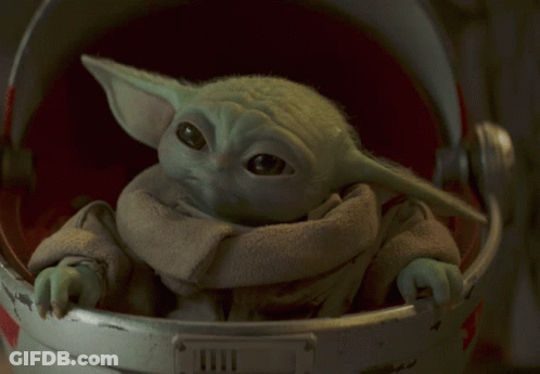 Baby Yoda Sitting In Helmet GIF