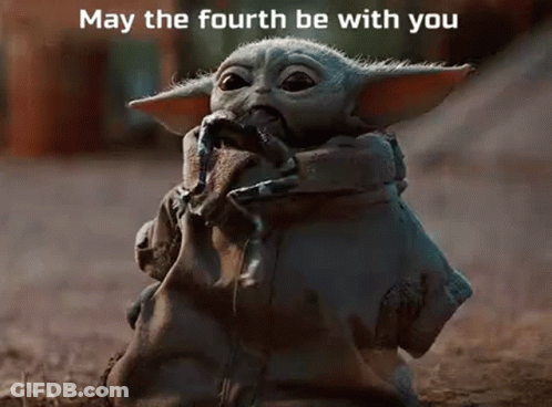 Baby Yoda Sitting On Ground Holding Rope GIF