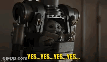 Baby Yoda Sitting On Robot Saying Yes GIF