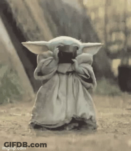 Baby Yoda Standing In Dirt Covering Face GIF