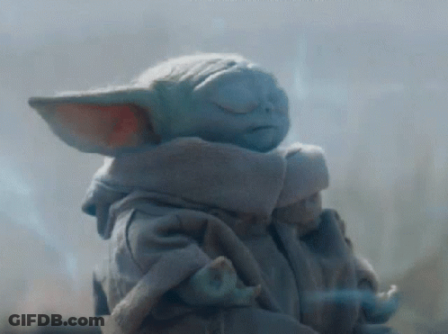 Baby Yoda Statue With Eyes Closed And Scarf GIF