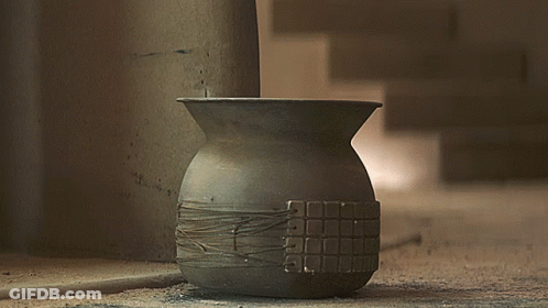 Baby Yoda Sticking Head Out Of Clay Pot GIF