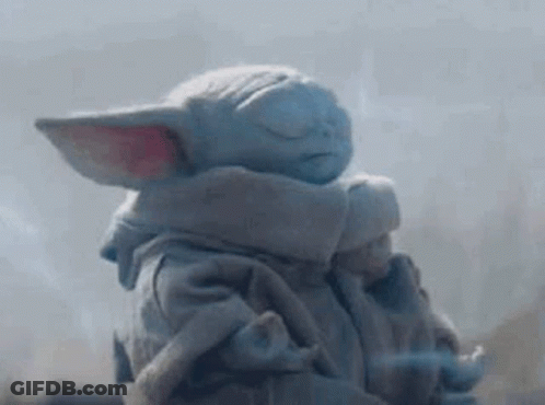 Baby Yoda With Eyes Closed And Scarf GIF