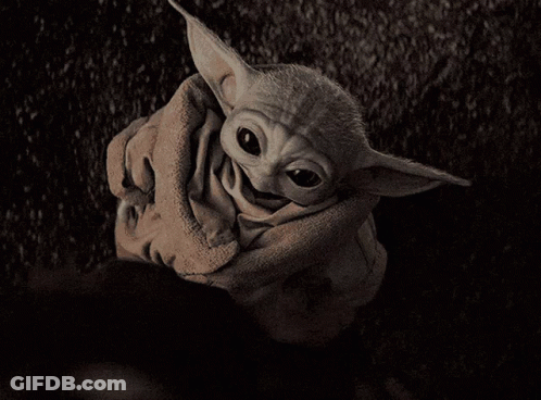 Baby Yoda Wrapped In Brown Blanket GIF