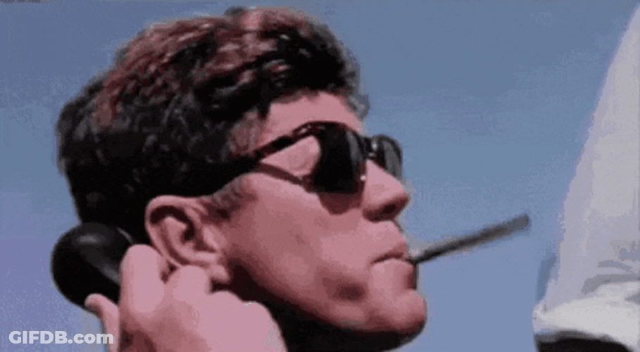 Back And To The Left JFK Smoking Cigar GIF