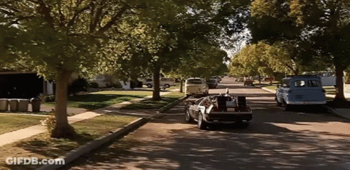 Back To The Future Car Driving Down Street GIF