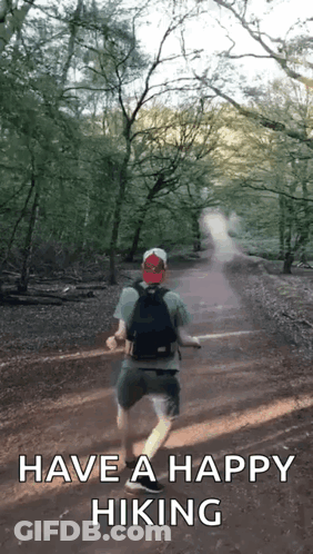 Backpacker On Dirt Path Saying Have Happy Hiking GIF