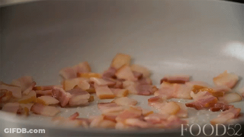 Bacon Is Being Cooked In A Frying Pan And A Circle Says Oh Hi Bacon GIF