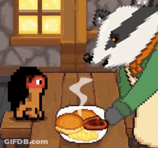 Badger Sitting At Table With Plate Of Food GIF