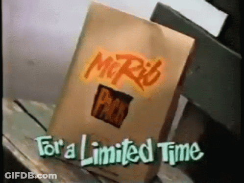 Bag Of Mr. Rib Packs On Wooden Table GIF