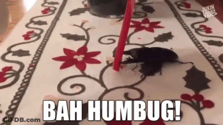 Bah Humbug Mighty Beetle Biting Candy GIF