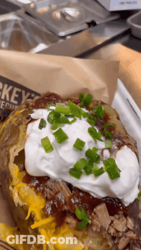 Baked Potato With Sour Cream And Onions GIF