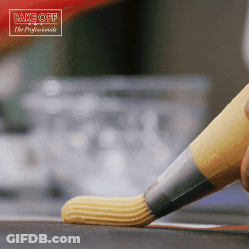 Baker Putting Neat Icing GIF