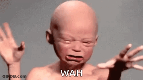 Bald Baby Crying With Funny Face GIF
