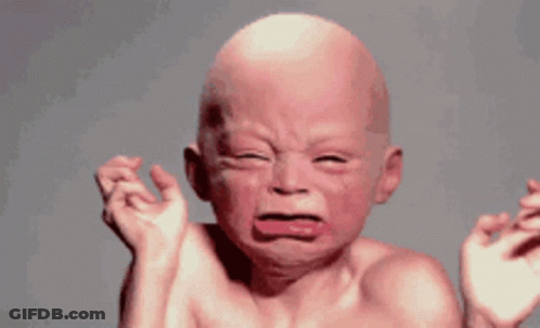Bald Baby Crying With Mouth Open GIF