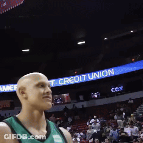 Bald Basketball Player In Front Of Credit Union Banner GIF