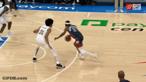 Bald Basketball Player In Yellow Jersey GIF