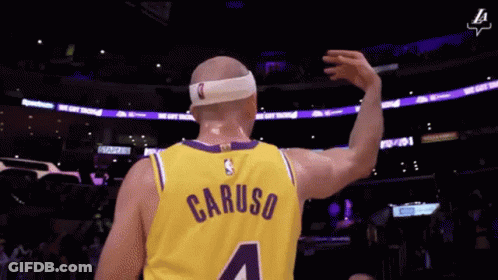 Bald Basketball Player In Yellow Jersey GIF