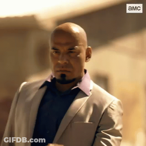 Bald Bearded Man In Suit And Blue Shirt GIF