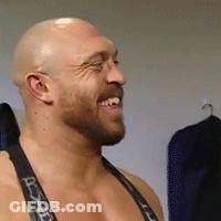 Bald Bearded Man Smiling In Tank Top GIF
