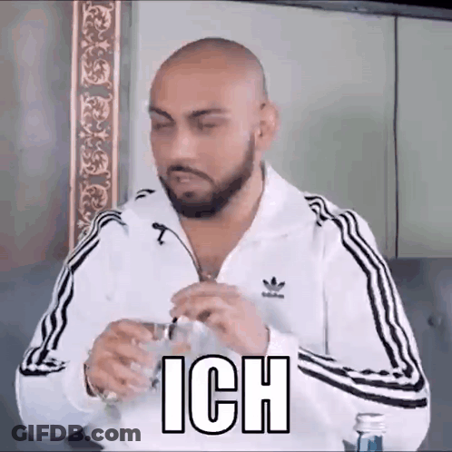 Bald Bearded Man With Glass Of Water GIF