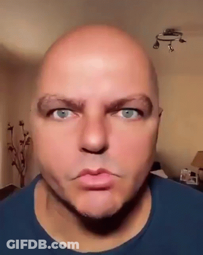 Bald Blue-Eyed Bearded Man In Blue Shirt Funny Face GIF