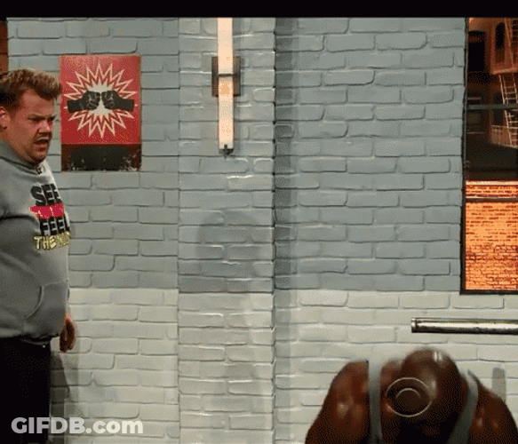 Bald Guy Holds Dumbbell Single Leg Deadlift GIF