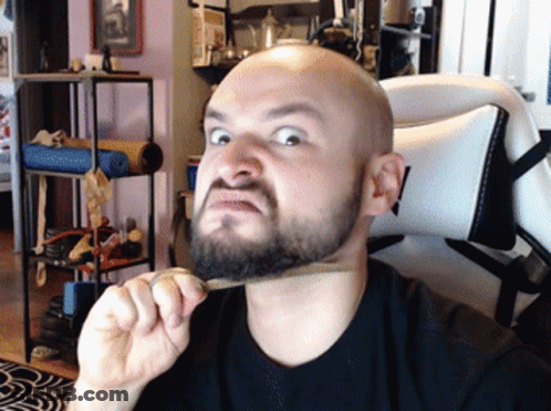 Bald Man Brushing Beard With Bamboo Brush GIF