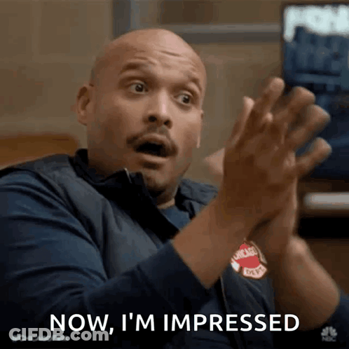Bald Man Clapping Saying Now I'm Impressed GIF
