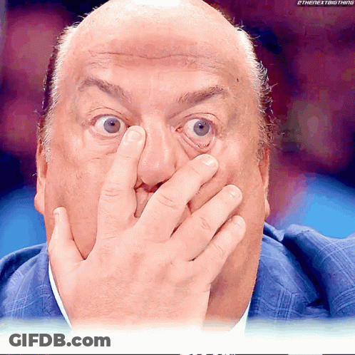 Bald Man Covering Face With Hand GIF