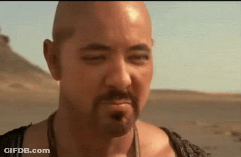 Bald Man Desert Eyes Closed And Mouth Open GIF