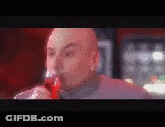 Bald Man Drinking Red Liquid From Bottle GIF