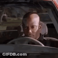 Bald Man Driving Car Looking Out Window GIF