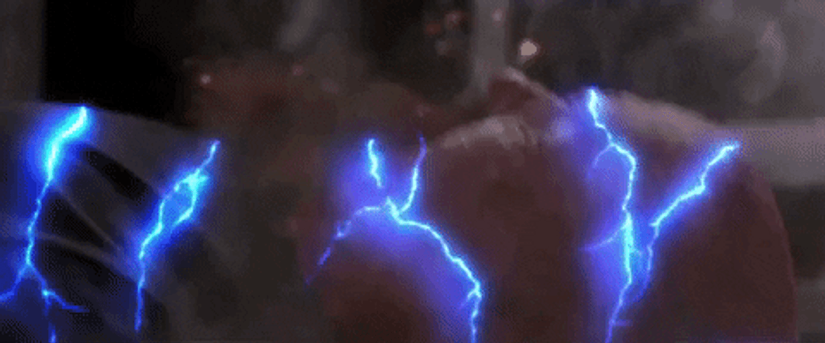 Bald Man Electricity Shock GIF