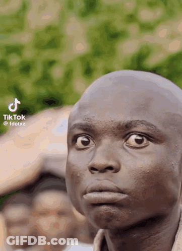 Bald Man Face With TikTok Logo GIF