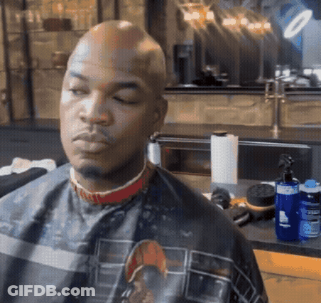 Bald Man Getting Haircut By Barber GIF