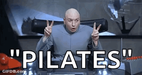 Bald Man Giving Peace Sign Saying Pilates GIF