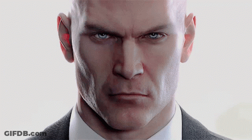 Bald Man Holding Guns Agent 427 On Twitch On Back GIF