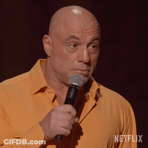 Bald Man Holding Microphone Netflix Logo GIF