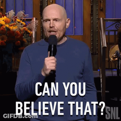 Bald Man Holding Microphone Says Can You Believe That GIF
