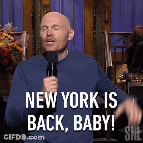 Bald Man Holding Microphone Says New York Is Back GIF