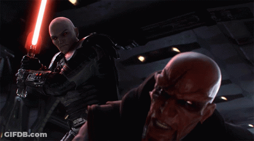 Bald Man Holding Red Light Saber GIF