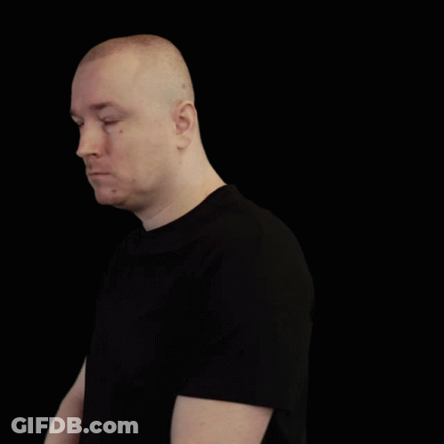 Bald Man In Black Shirt Crosses Arms GIF