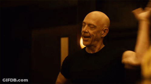 Bald Man In Black Shirt Eyes Closed GIF