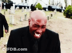 Bald Man In Black Suit Crying In Cemetery GIF