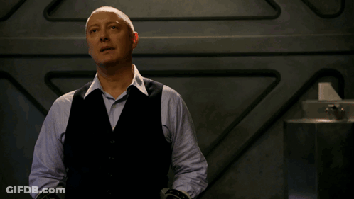Bald Man In Black Vest And Blue Shirt GIF