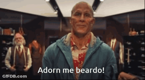 Bald Man In Blue Jacket Says Adorn Me Beard GIF