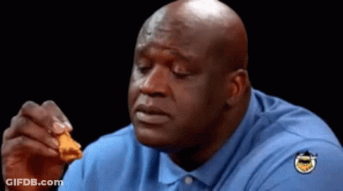 Bald Man In Blue Shirt Eating Fried Chicken GIF